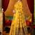 Mustard cotton blend saree with traditional ethnic motifs and includes blouse piece