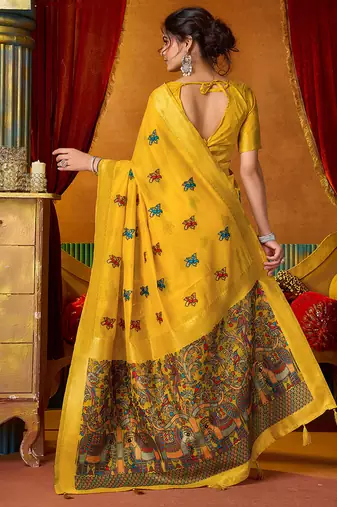 Mustard cotton blend saree with traditional ethnic motifs and includes blouse piece