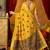 Mustard cotton blend saree with traditional ethnic motifs and includes blouse piece