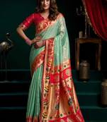Sea green soft tissue silk blend paithani style saree with blouse piece