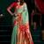 Sea green soft tissue silk blend paithani style saree with blouse piece