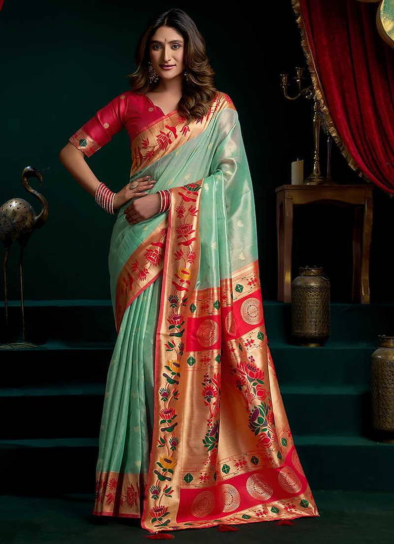 Sea green soft tissue silk blend paithani style saree with blouse piece