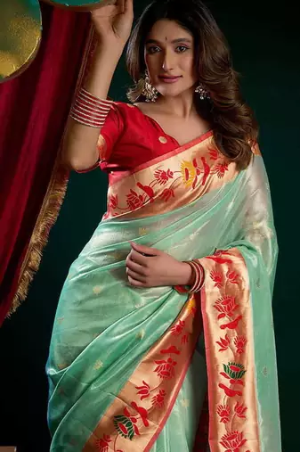 Sea green soft tissue silk blend paithani style saree with blouse piece