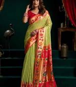 Light green soft tissue silk blend paithani style saree with blouse piece