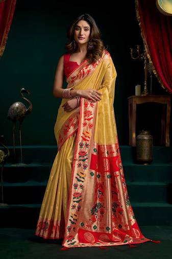Yellow soft tissue silk blend paithani style saree with blouse piece
