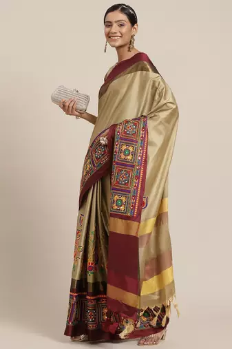 Women beige & maroon embellished kutchi embroidered silk cotton saree