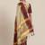 Women beige & maroon embellished kutchi embroidered silk cotton saree