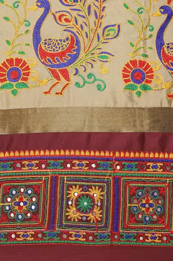 Women beige & maroon embellished kutchi embroidered silk cotton saree