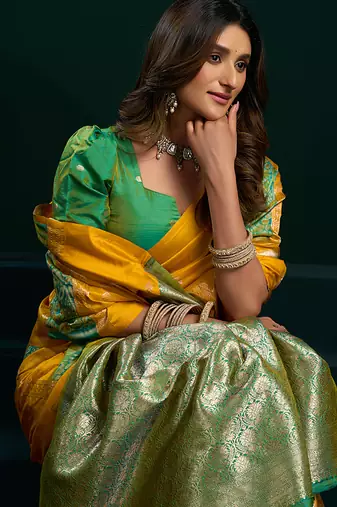 Mustard soft banarasi silk blend zari weaving saree with blouse piece