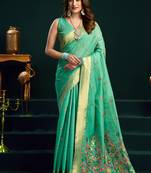 Sea green cotton blend saree with floral meenakari pallu and gold zari border