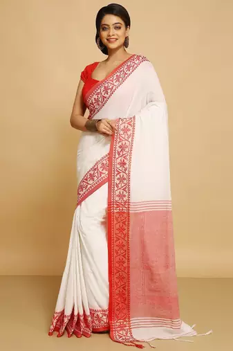 white saree with traditional woven border design