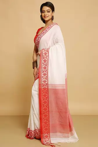 white saree with traditional woven border design