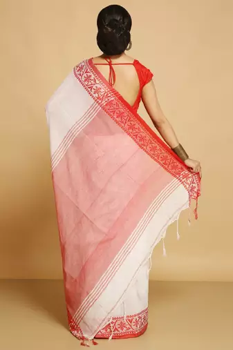 white saree with traditional woven border design