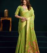 Light green cotton blend saree with floral meenakari pallu and gold zari border