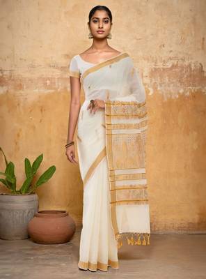 Off white ethnic motif woven design zari pure cotton kasavu saree 1