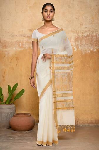 Off white ethnic motif woven design zari pure cotton kasavu saree