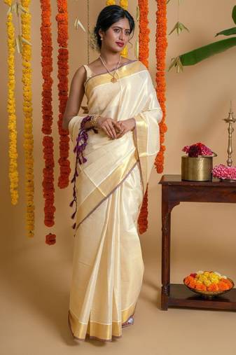 cream kasavu tissue saree with solid pattern design
