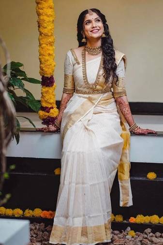 white kanjeevaram saree with woven pattern design