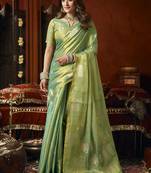 Sea green tissue silk blend saree with cow butta weaving work