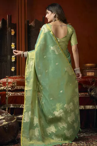 Sea green tissue silk blend saree with cow butta weaving work