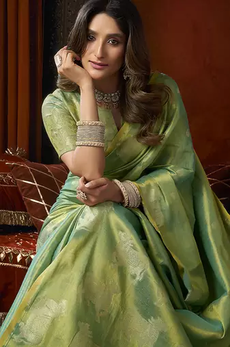 Sea green tissue silk blend saree with cow butta weaving work