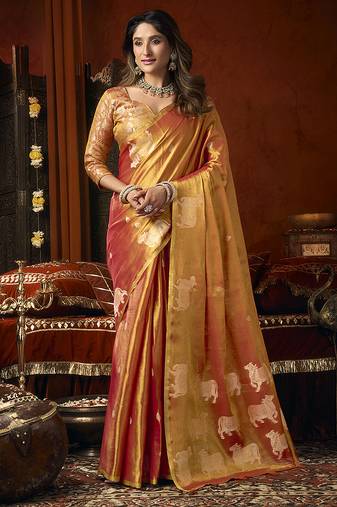 Orange tissue silk blend saree with cow butta weaving work