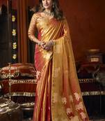 Orange tissue silk blend saree with cow butta weaving work