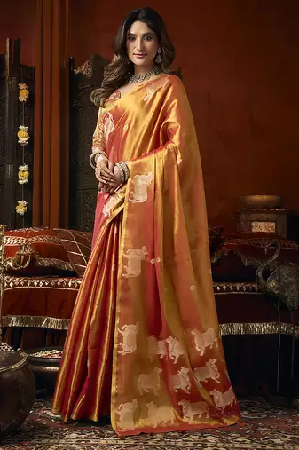 Orange tissue silk blend saree with cow butta weaving work