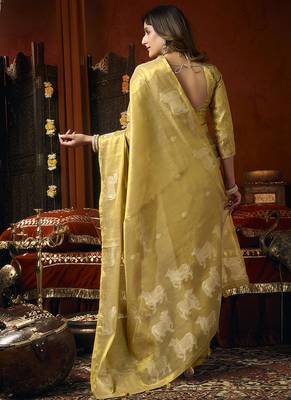 Golden yellow tissue silk blend saree with cow butta weaving work 3