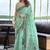 Turquoise floral printed linen jacquard saree with unstiched blouse piece