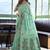 Turquoise floral printed linen jacquard saree with unstiched blouse piece
