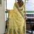 Light yellow floral printed linen jacquard saree with unstiched blouse piece