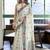 Off white floral printed linen jacquard saree with unstiched blouse piece