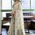Off white floral printed linen jacquard saree with unstiched blouse piece