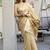 Beige cotton blend jacquard saree with traditional paithani pallu
