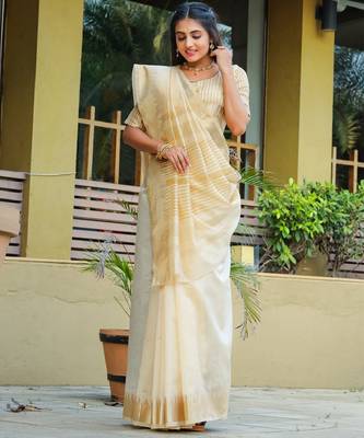 Cream-coloured zari detailed silk cotton saree 1