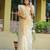 Cream-coloured zari detailed silk cotton saree