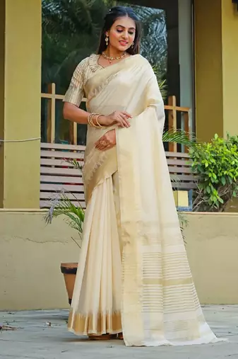 Cream-coloured zari detailed silk cotton saree