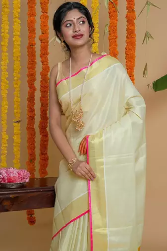 Women woven design zari tissue kasavu saree