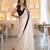 white mysore silk saree with traditional design