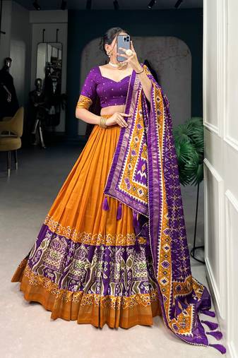 Mustard Navaratri Special Tussar Silk Patola Printed Lehenga with unstitched Blouse