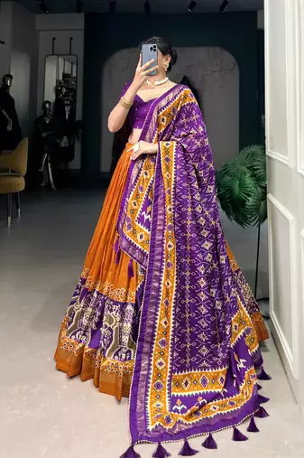 Mustard Navaratri Special Tussar Silk Patola Printed Lehenga with unstitched Blouse