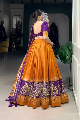 Mustard Navaratri Special Tussar Silk Patola Printed Lehenga with unstitched Blouse