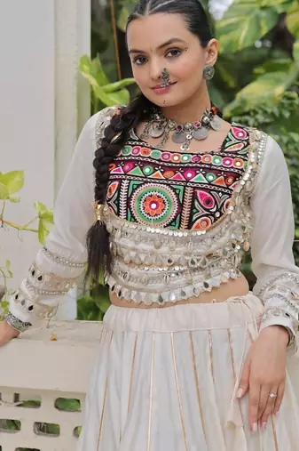 Off White Navaratri Special Gota Patti Work Lehenga with Gamthi Mirror Patch & Cowrie Lace work Choli
