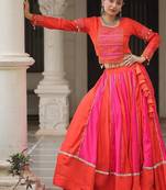 Orange Navaratri Special Mirror Lace Work Lehenga with Gamthi & Cowrie Lace work Choli