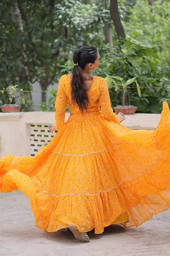 Yellow Navaratri Special Faux Georgette Bandhej Print with Gotta Patti Lace Work Lehenga Choli