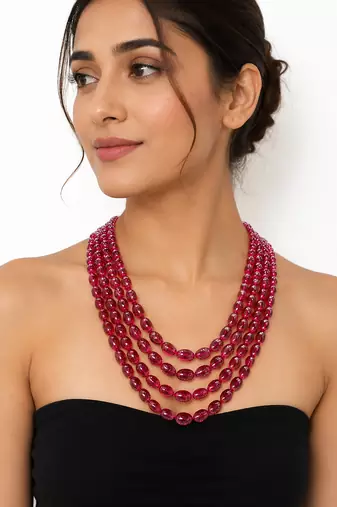 PRECIOUS OVAL SHAPE RUBIES WITH 4 STRANDS 