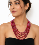 PRECIOUS OVAL SHAPE RUBIES WITH 4 STRANDS 