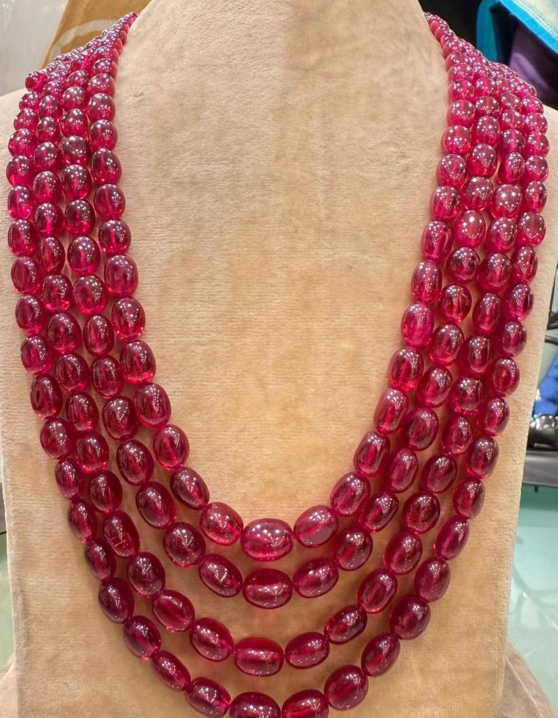 PRECIOUS OVAL SHAPE RUBIES WITH 4 STRANDS 