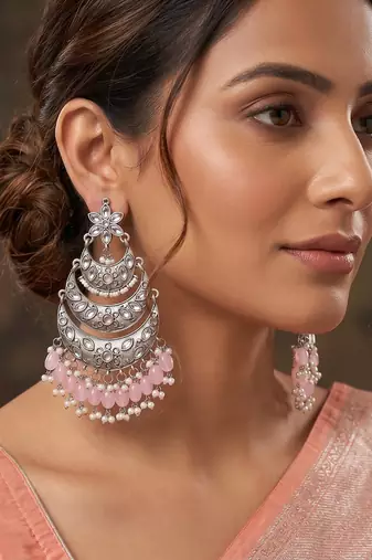 Oxidized silver-toned layered chandbali earrings with blush pink drops